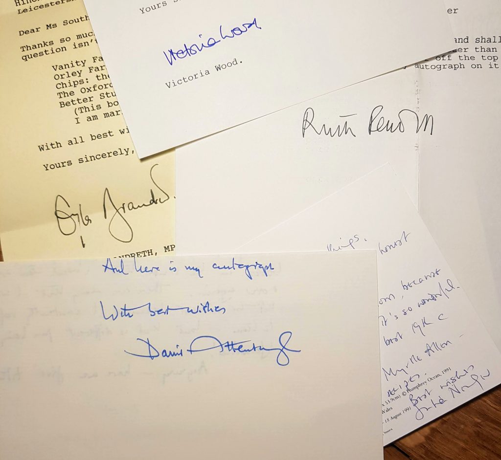 A pile of letters from various well known people, showing their signatures.